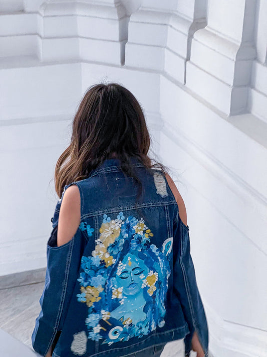 Blue Cold Shoulder Denim Jacket with Big Blue Painted Face and Flowers on the Back