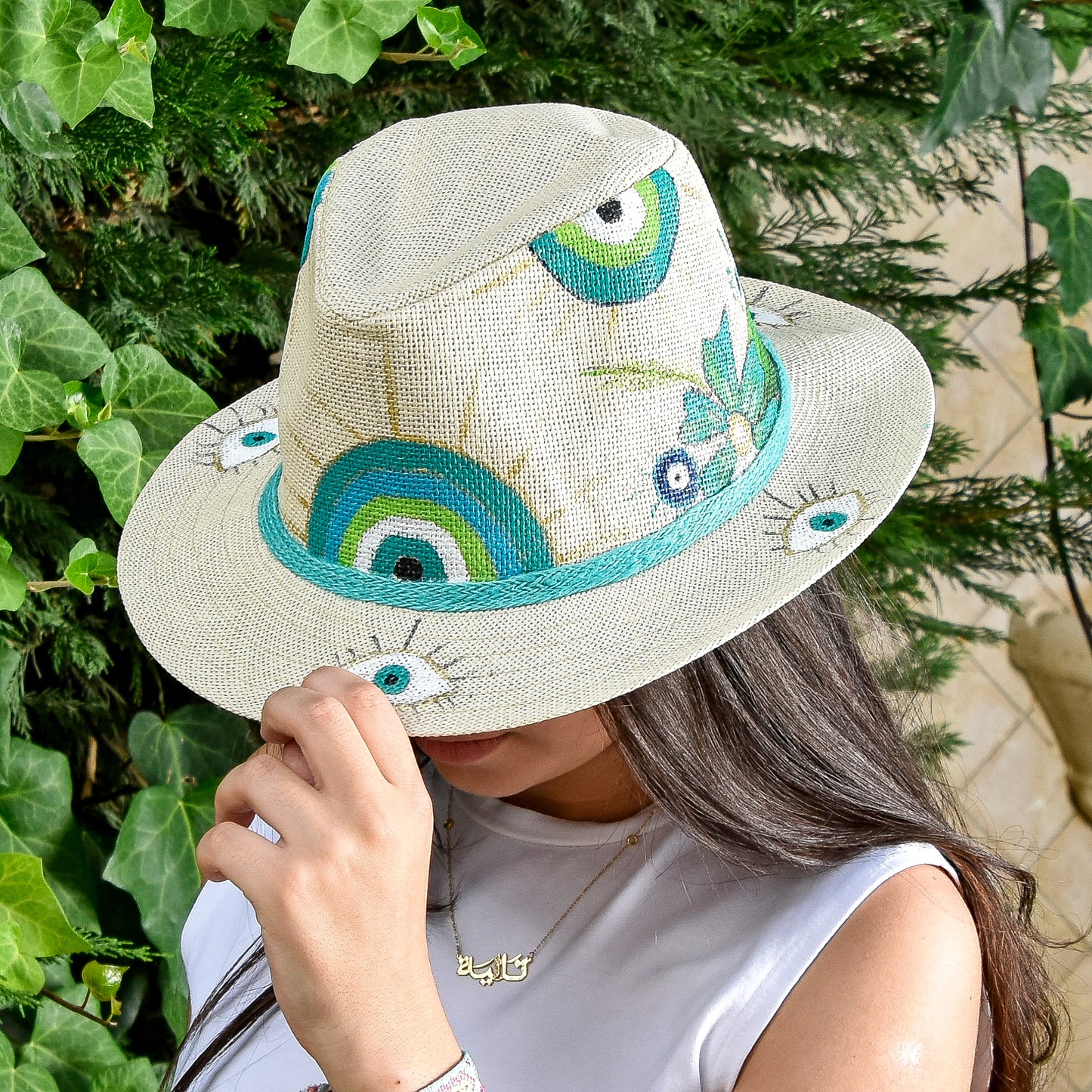 Medium Eyes, Flower and Green and Turquoise Rainbow Hat